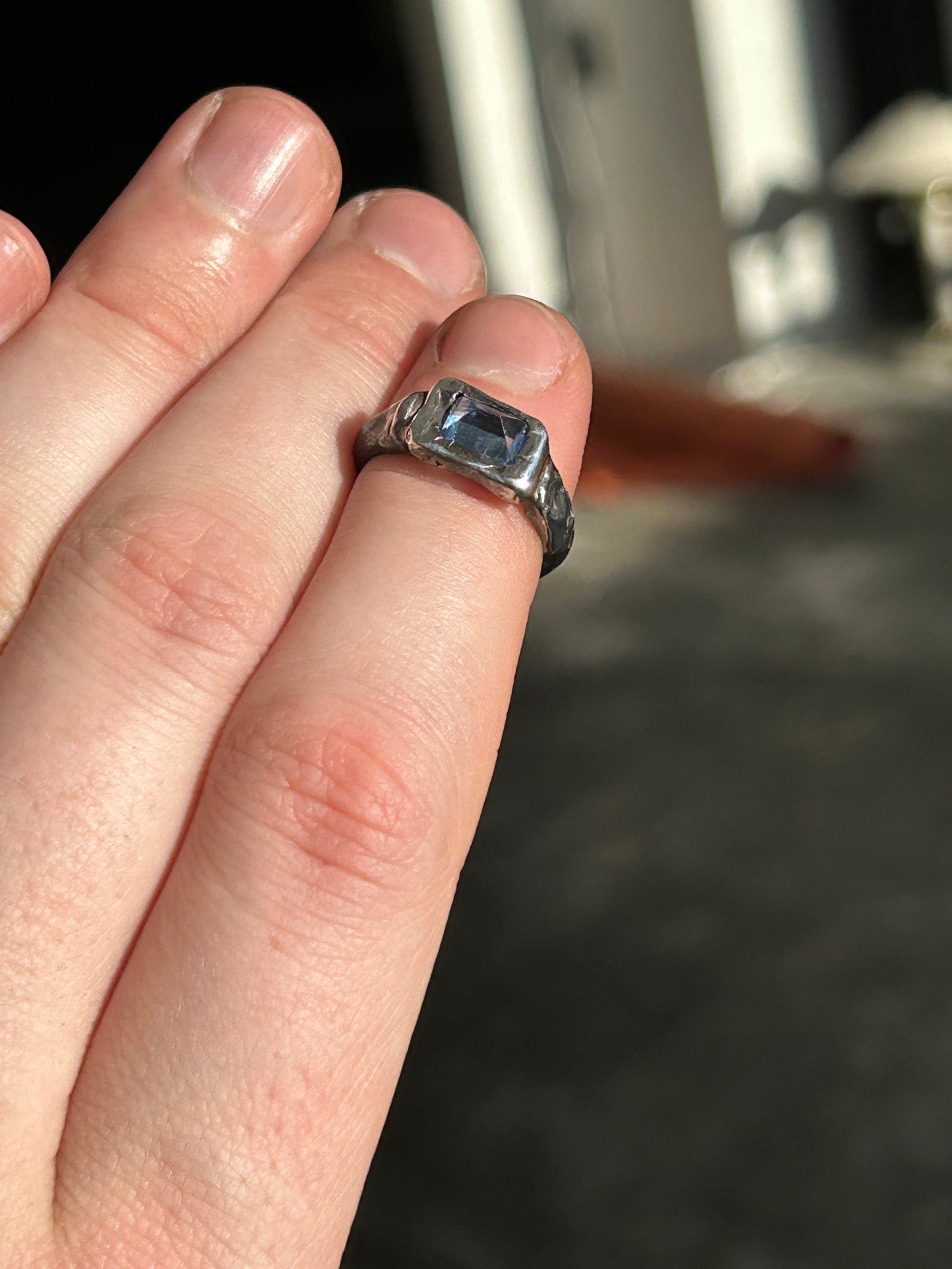 Topaz on oxidized silver